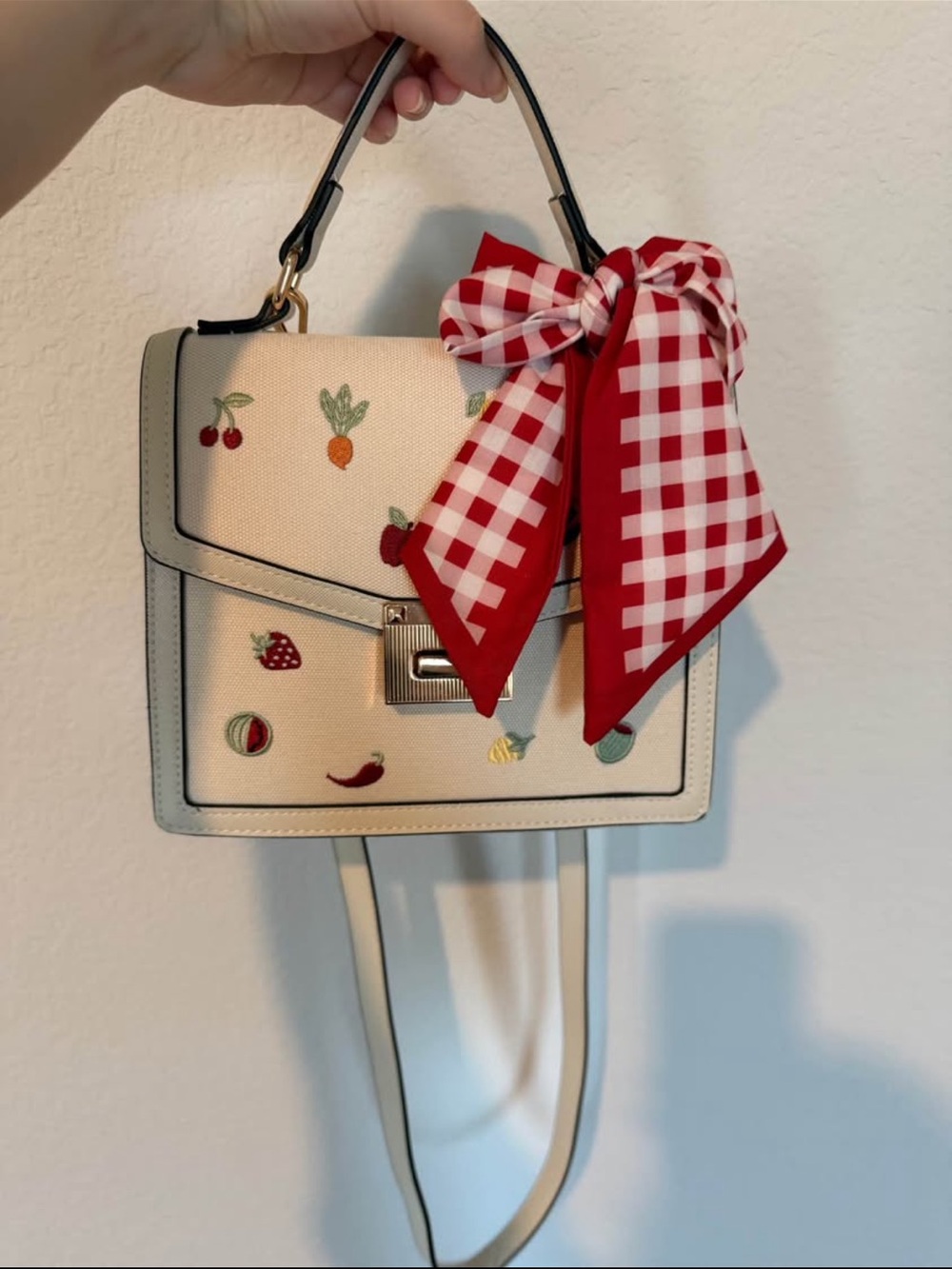 Aldo Cream Crossbody Top-Handle Bag with Red Gingham Bow and Fruit Embroidery